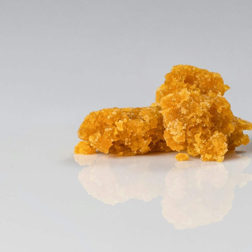 brown popcorn on white surface